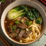 Heartwarming Taiwanese Beef Noodle Soup with tender beef, noodles, and vegetables
